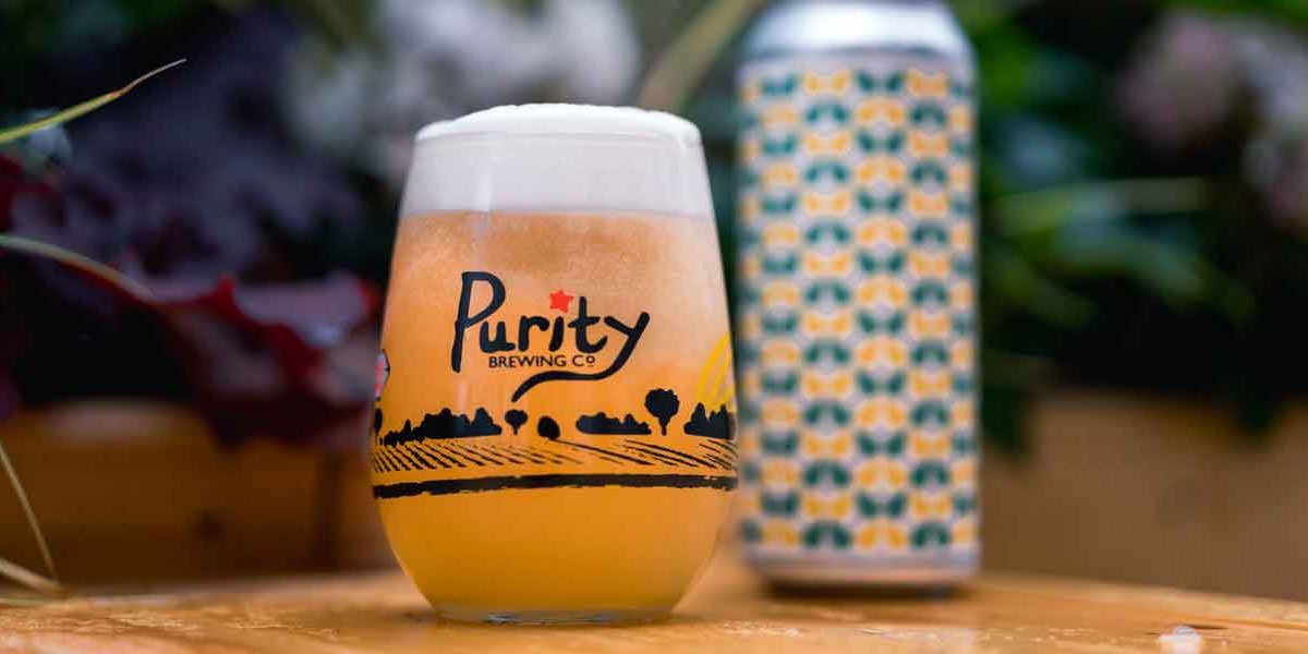 Purity Brewing Co Beer Glass with pattern Can alongside