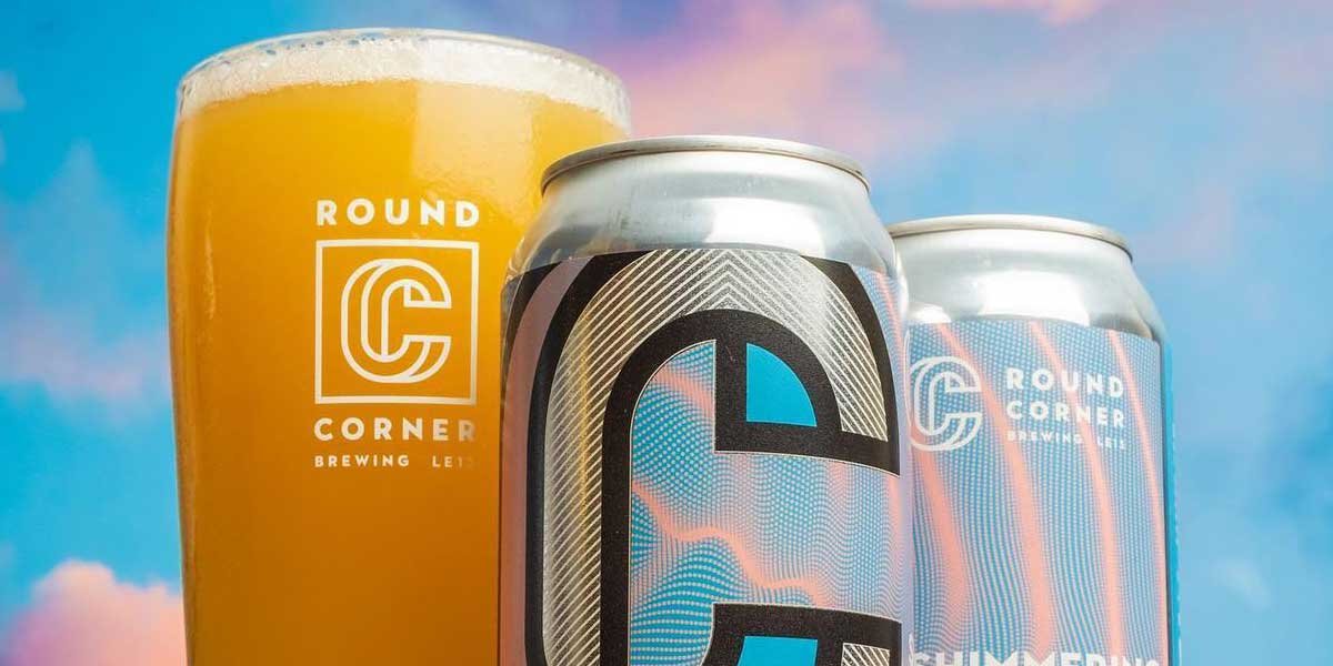 Round Corner Brewing Beer in Glass with Can alongside